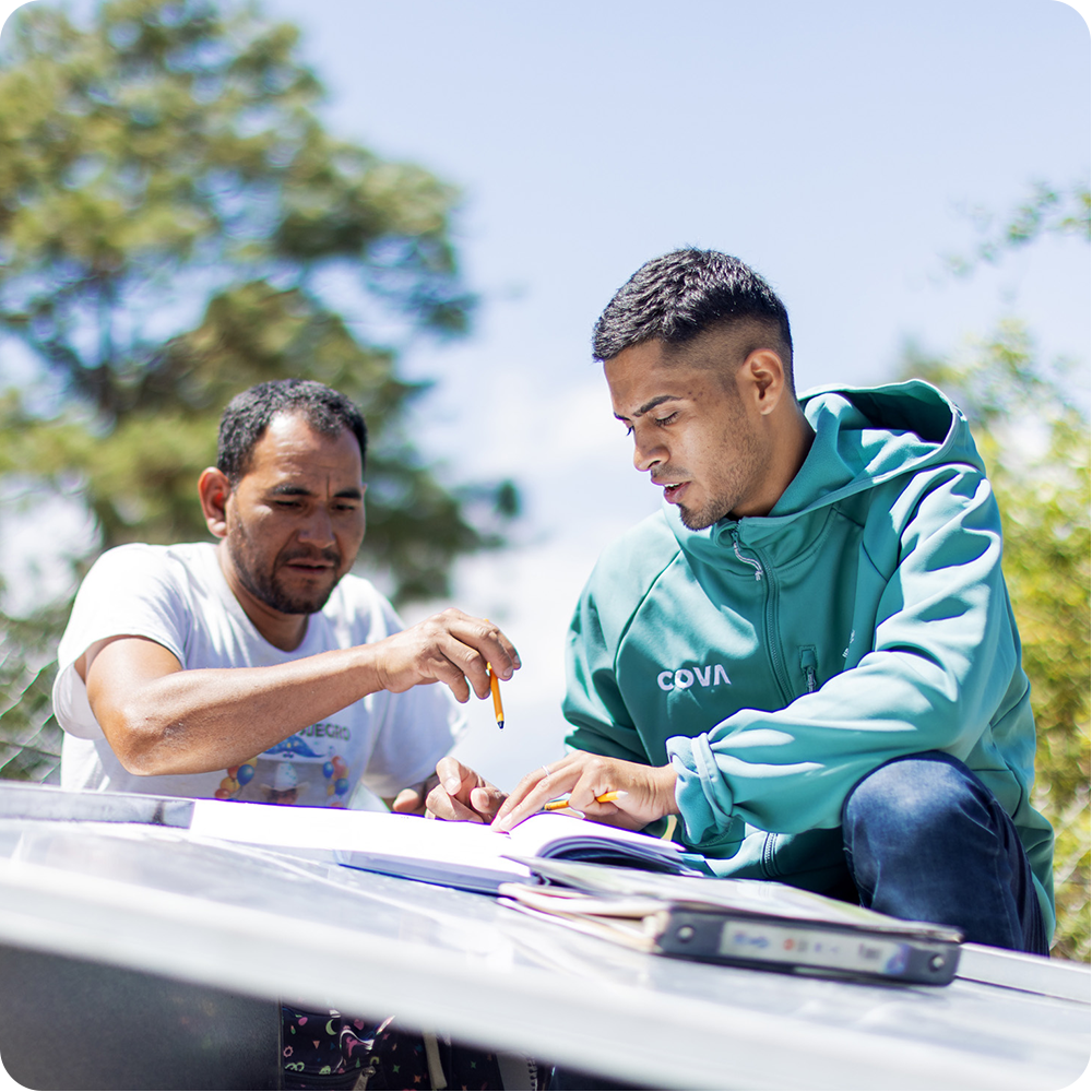 market-based-square Cova Circuit Rider Water Technician assisting Central American community member.